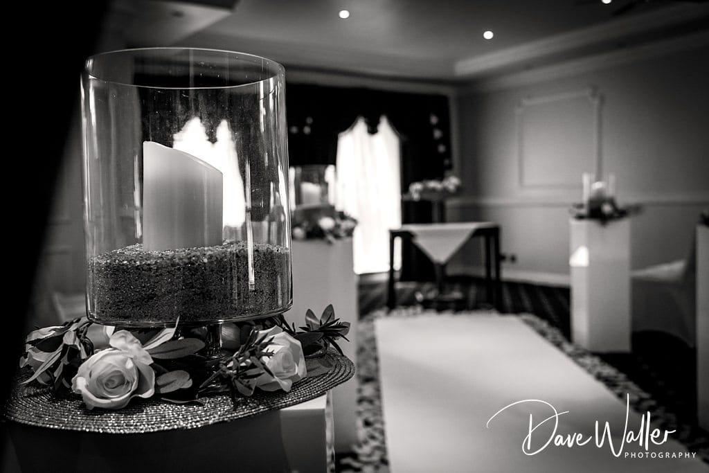 A magical evening: Sanchia and James, newlyweds, celebrate under a starlit sky with a sparkling champagne toast outside an elegant manor house at Waterton Park.