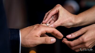 Exchanging wedding rings: a symbol of eternal love and commitment.