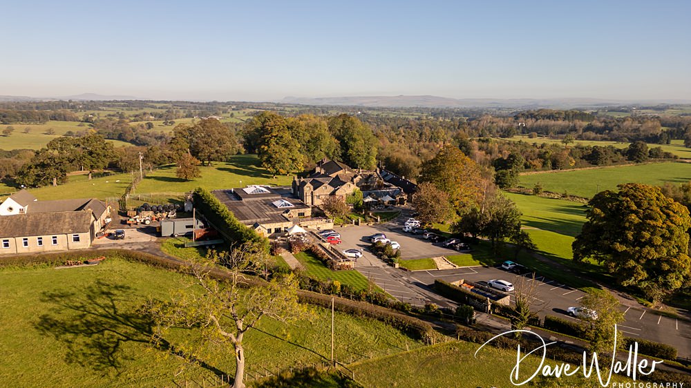 Aerial view of countryside property and landscape.