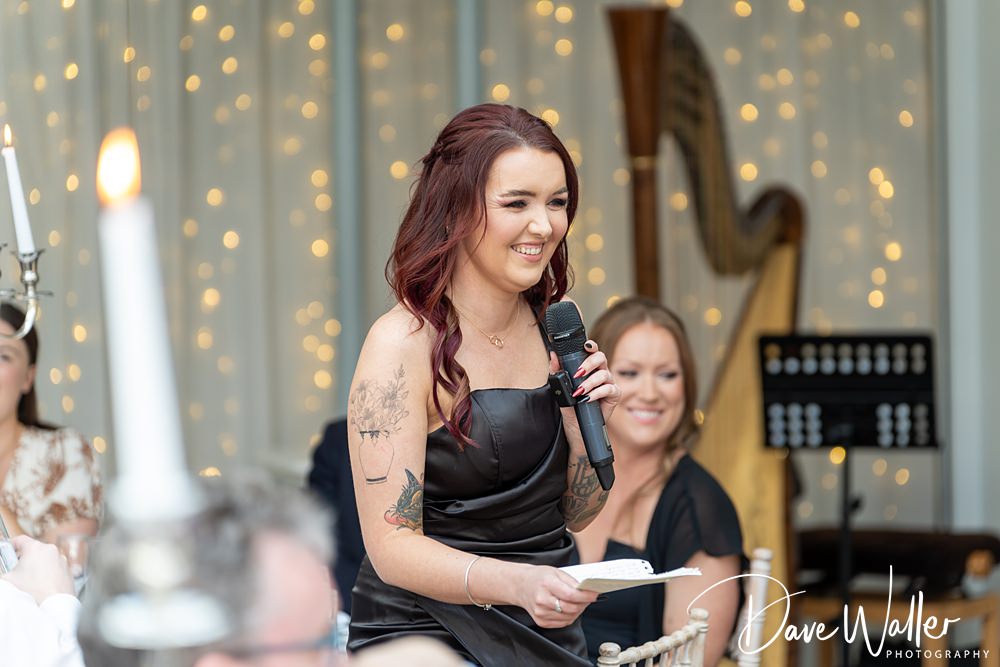 Woman giving speech at festive event