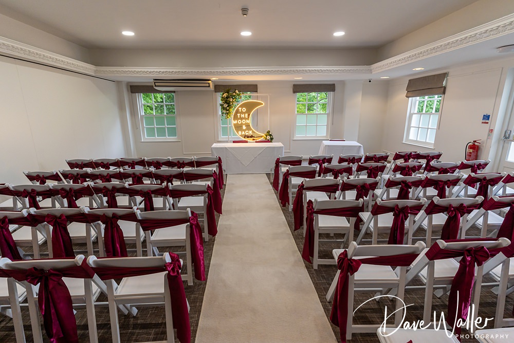 Wedding ceremony room with moon-themed decor.