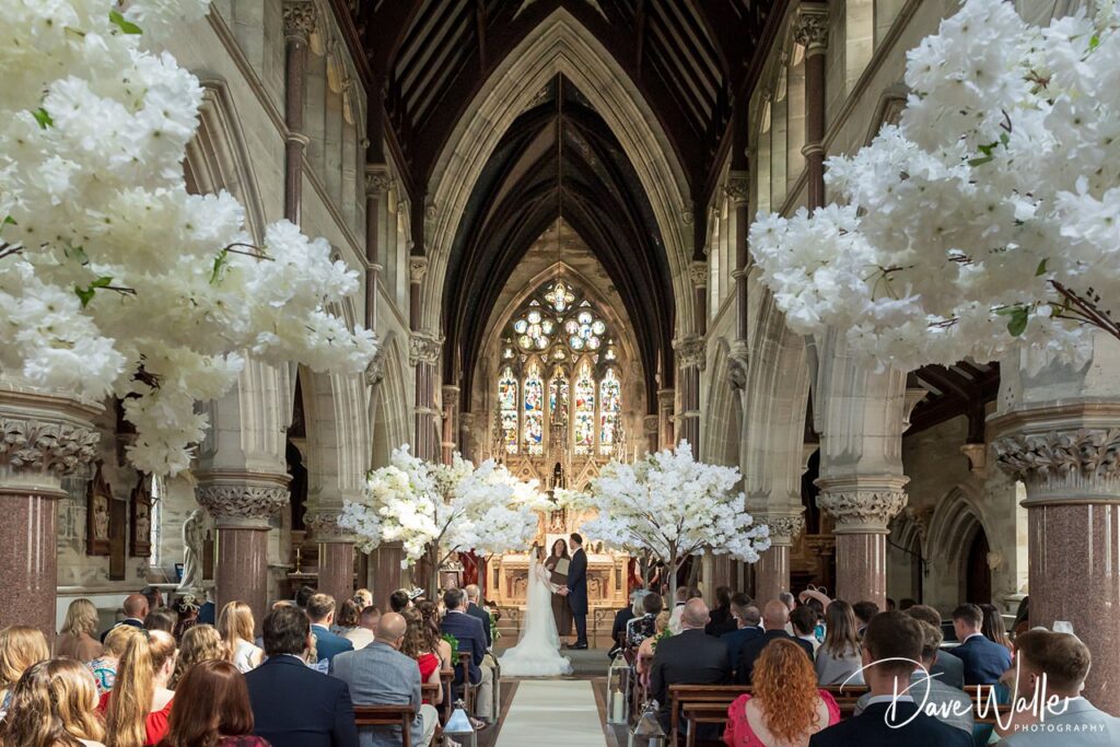Bride and groom in church wedding ceremony.