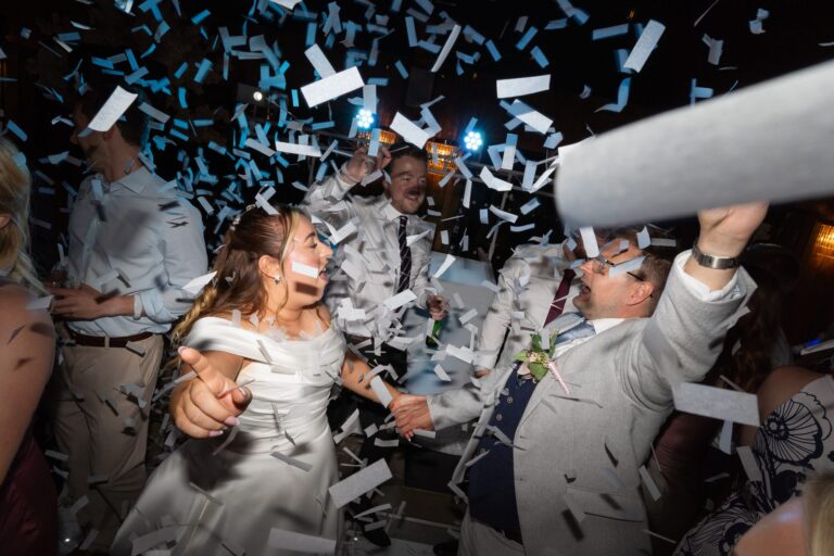 Confetti cannons going off over Jake and Lauren on the dance floor