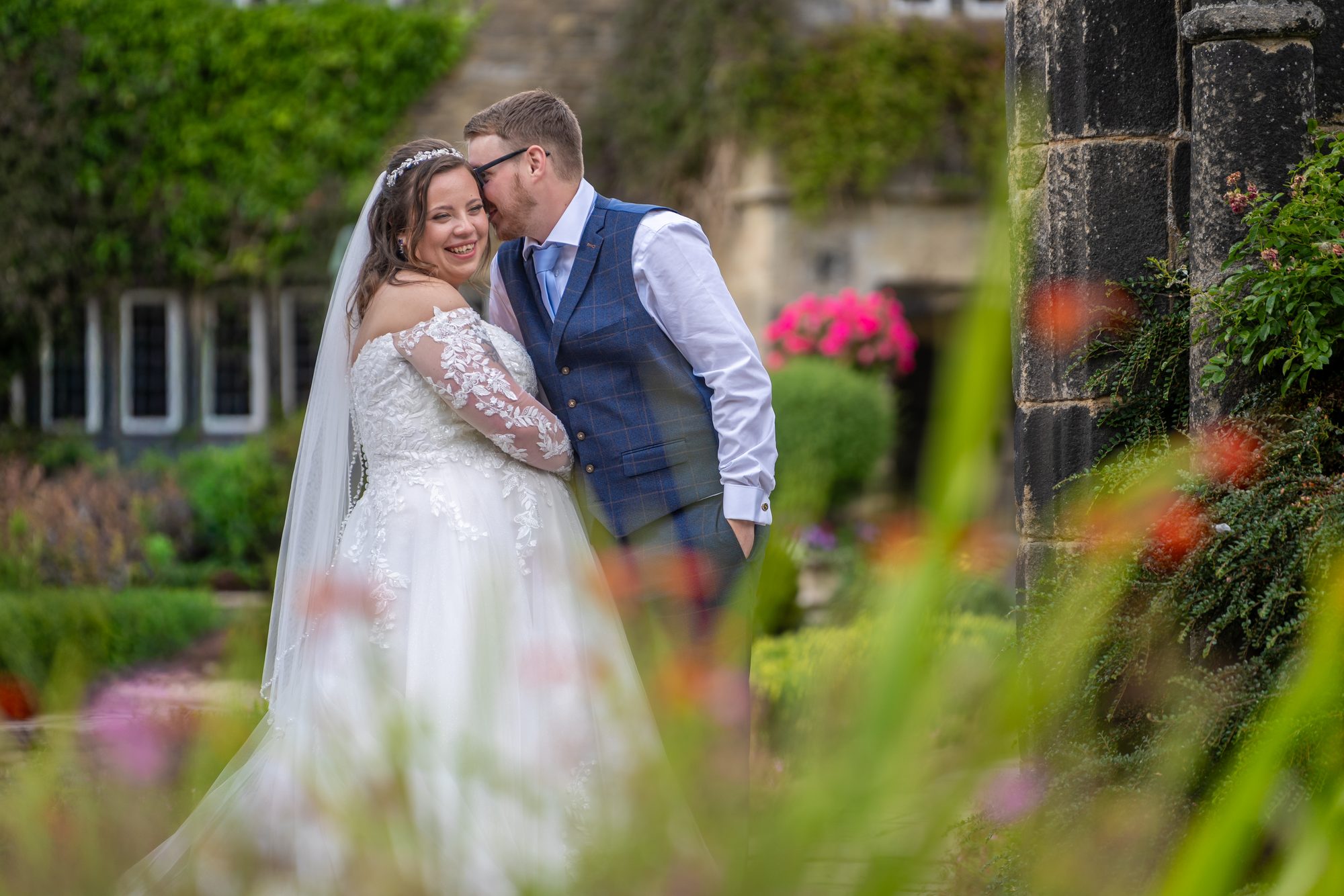 Shannon and Scott sharing a cuddle in the flower gardens at Holdsworth House, Halifax