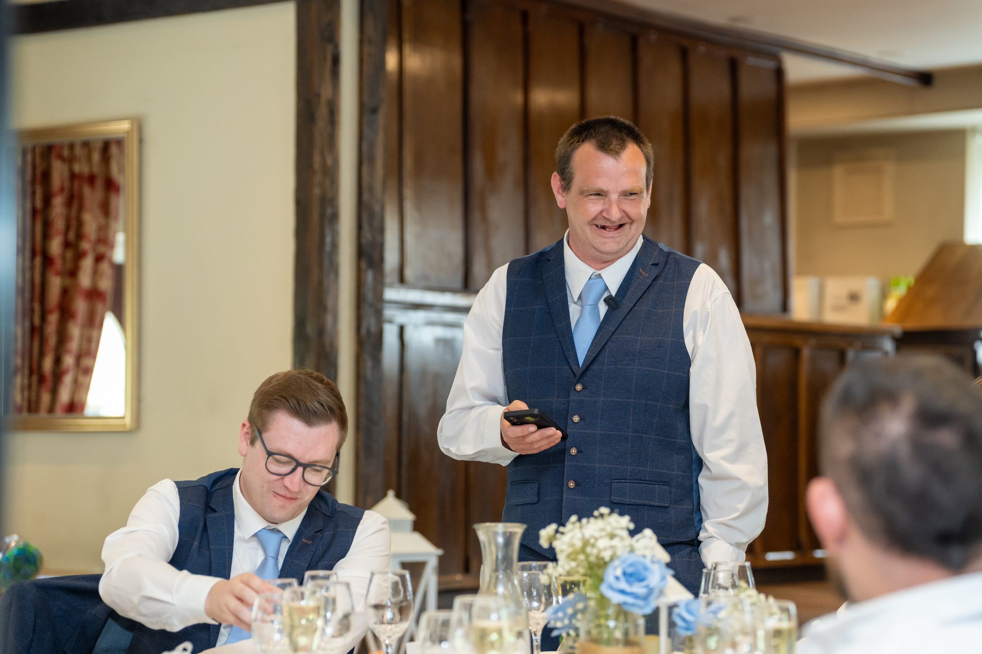 Another speech at the top table, with guests turned to listen